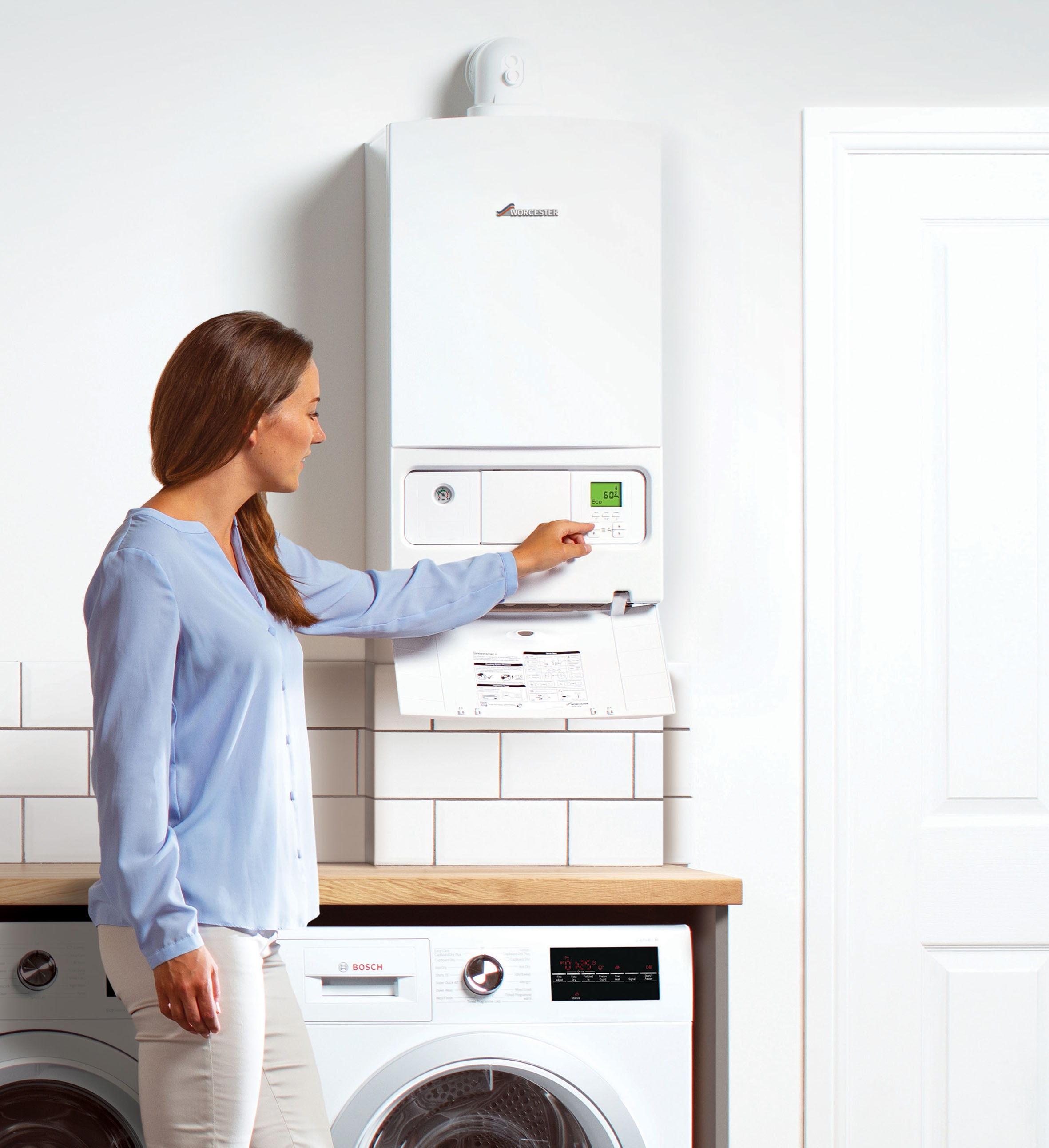 Woman checking her boiler
