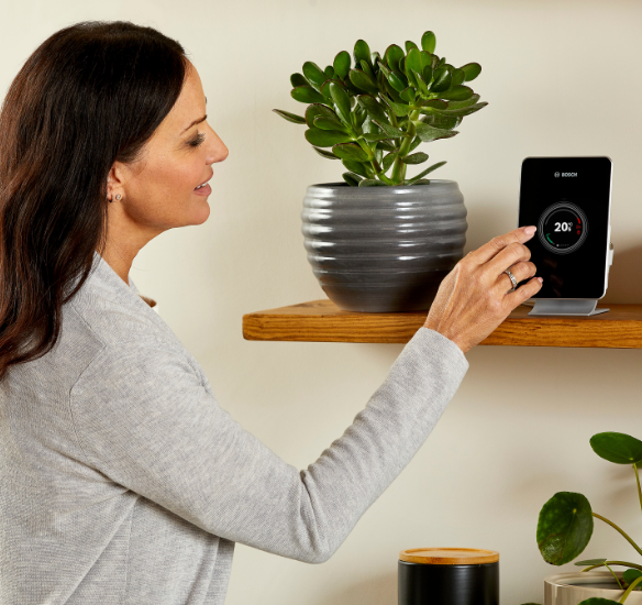 woman using black bosch easycontrol
