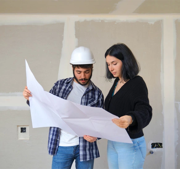 Installer helping lady with renovation