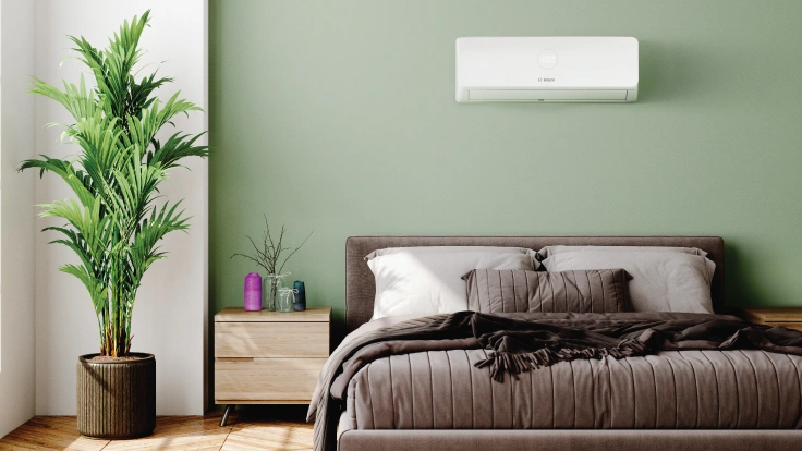 Installer repairing boiler