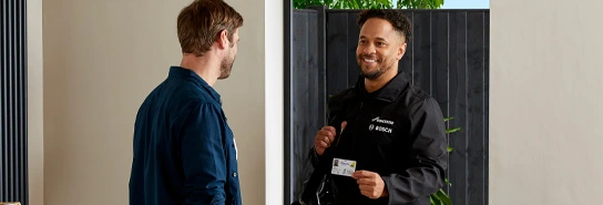 Engineer showing customer their Gas Safe ID