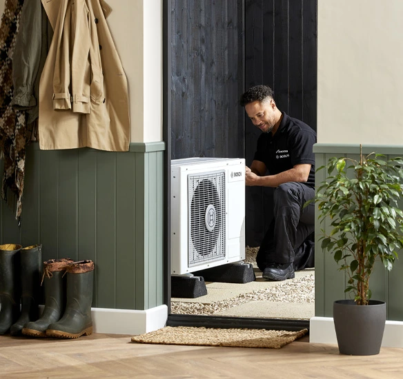 installer with outdoor heat pump unit