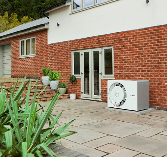 5800 heat pump outdoor unit in garden