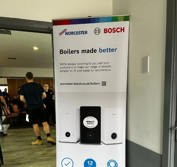 Boilers Made Better pull up at the entrance of the building