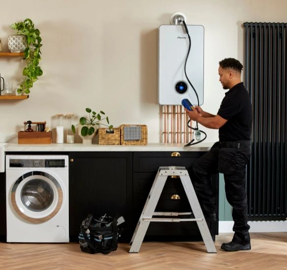 Installer checking the flue of a Greenstar 8000 boiler