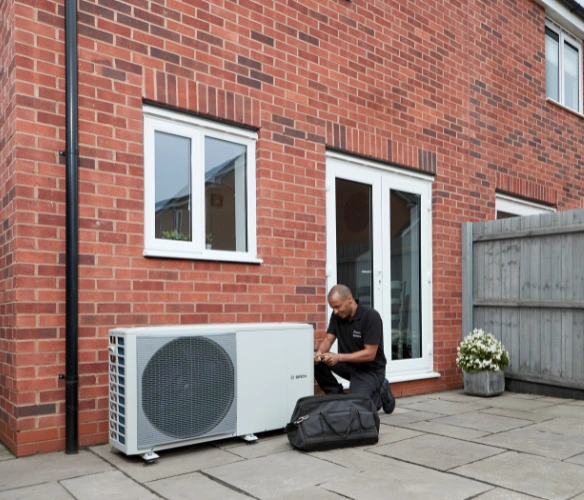 Installer with Compress 2000 heat pump