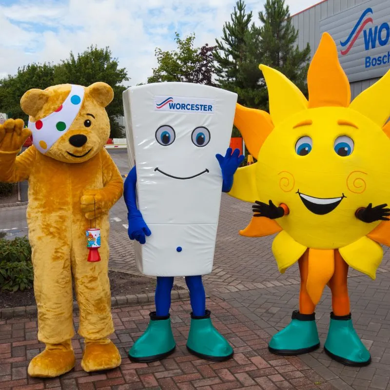 Bobby with Pudsey bear and solar sam mascots