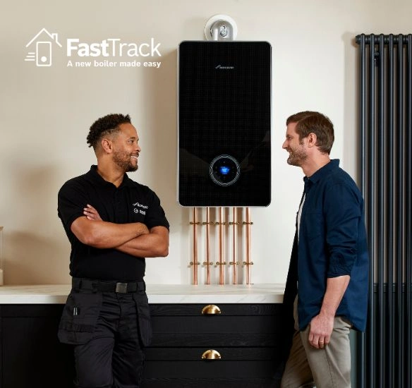 Installer talking with customer with FastTrack logo
