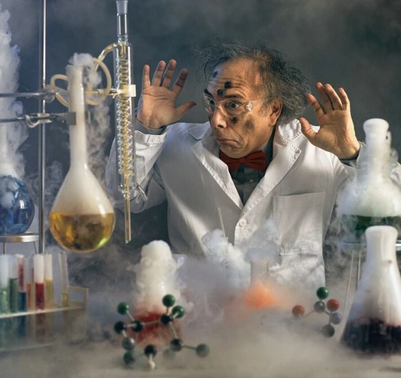 Mad scientist in front of equipment