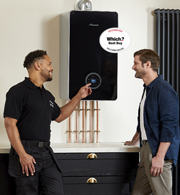 Worcester Bosch Accredited Installer showing a customer how to use their new boiler