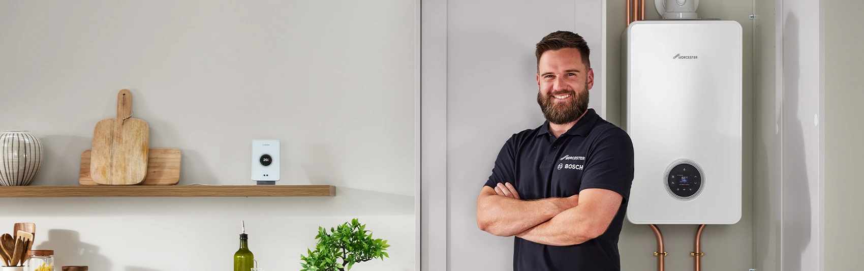 Installer and homeowner with boiler